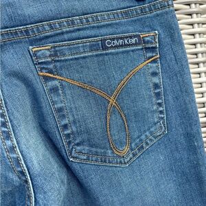 Calvin Klein boot cut darker wash jeans